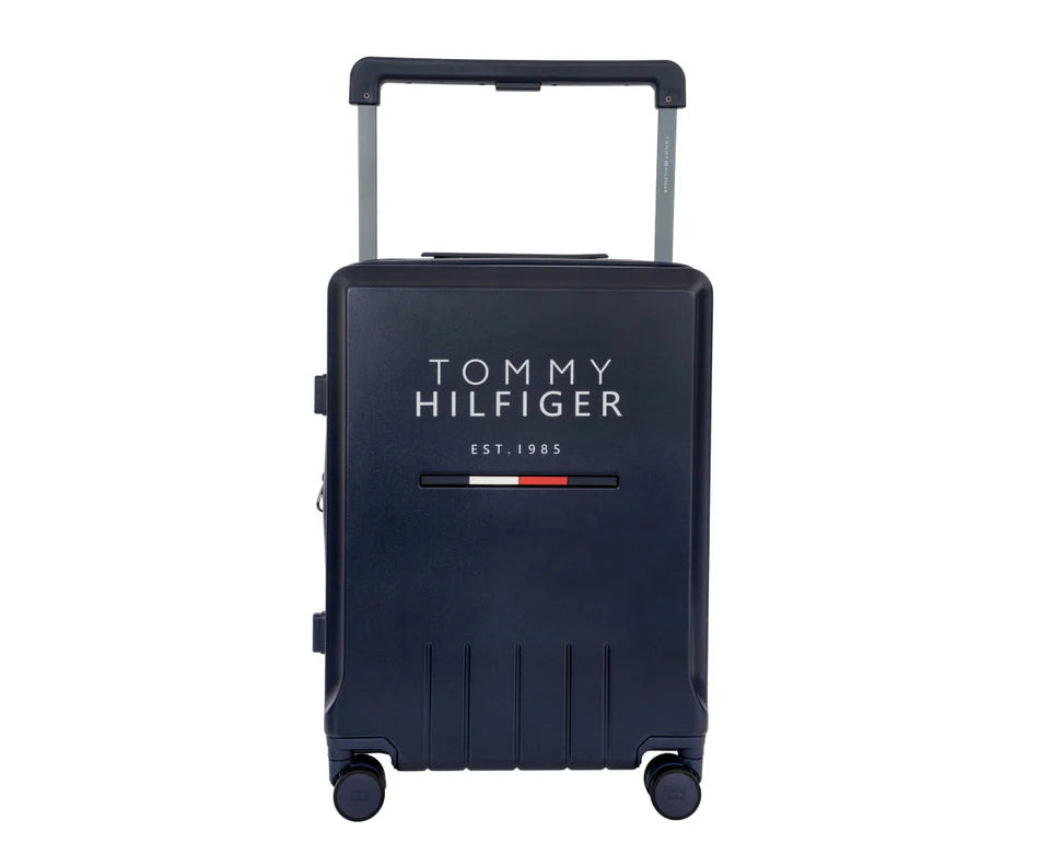 Tommy Hilfiger navy blue suitcase on a white background