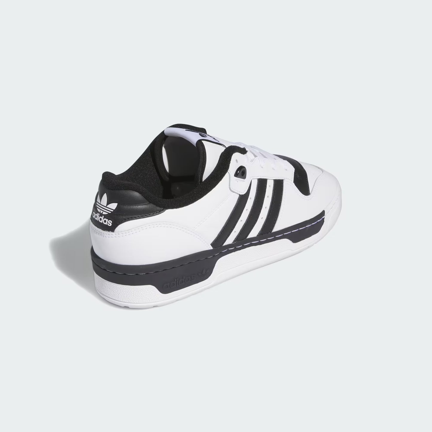 Adidas Rivalry Low Shoes White Black IG1474 three-quarter rear view showing outsole profile and heel construction