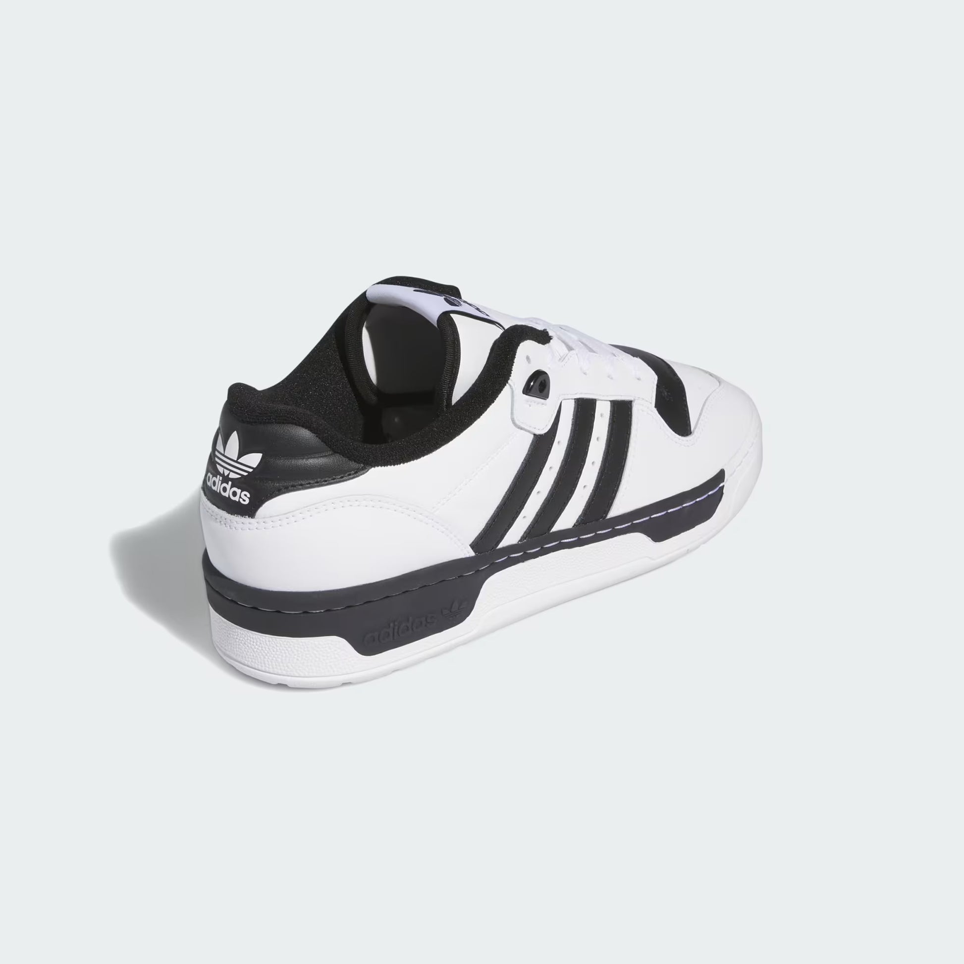 Adidas Rivalry Low Shoes White Black IG1474 three-quarter rear view showing outsole profile and heel construction